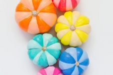 colorful painted rainbow pumpkins are a fun and timeless idea to make your fall decor feel like pride