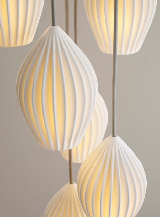 lamps are inspired by traditional Chinese lanterns and are handmade using British crafting techniques