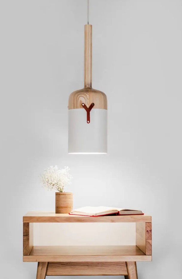 this pendant lamp has a cool bottle-resembling design and is made of a unique blend of materials, which aren't characteristic for lamps