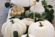 a simple yet cute centerpiece with pumpkins