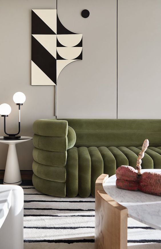 a beautiful and catchy green sofa featuring fluting is a very up-to-date piece for a contemporary space as fluting is on top