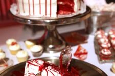 a bloody cake with blood dripping and lots of sugar shards with blood is an ideal solution for a Halloween party