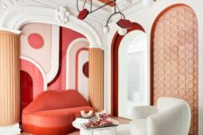 a bold and cool lip-shaped red sofa works perfect in this whimsical living room and will add a touch of fun