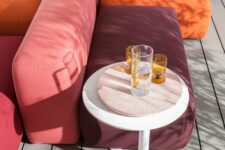 a colorful modular sofa in orange, purple and pink is a cool and fun idea for outdoors and can be used for indoors