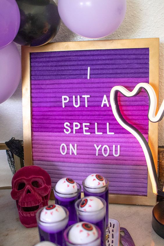 an ombre purple sign like this one is easy to make and can decorate any space of your home for Halloween