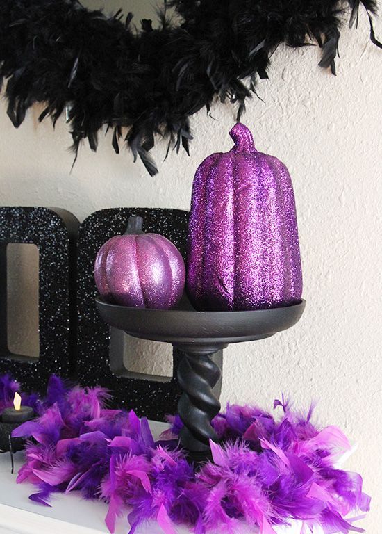 purple glitter pumpkins and purple feathers for elegant and shiny Halloween decor with touches of purple