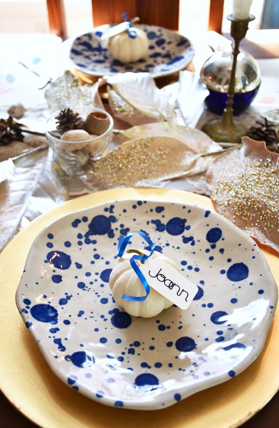 a blue and white polka dot plate is a fresh and bold touch to your modern Thanksgiving table