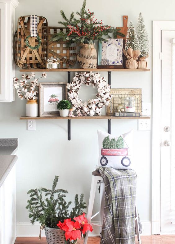 baskets, cotton arranhements, snowy Christmas trees, evergreens and berries for holiday decor