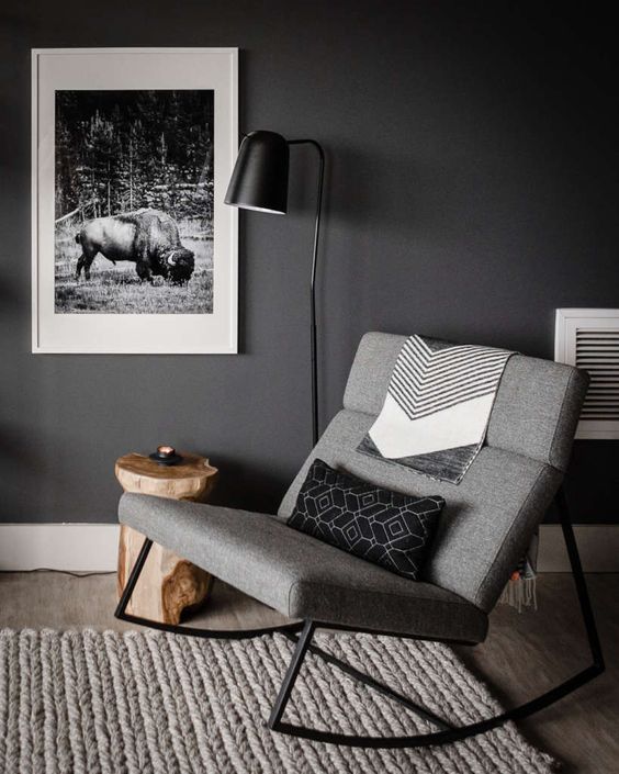 a beautiful grey mid-century modern rocker with black metal legs and no armrests will make a statement in the space