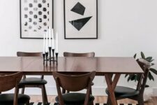 a lovely dining space with a gallery wall