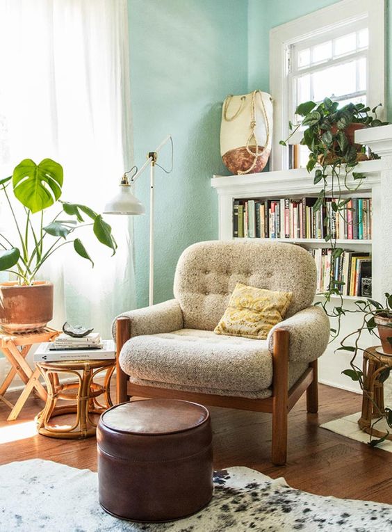 a cozy terrazzo-themed mid-century modern chair with soft armrests and a stained frame and legs is a cool idea