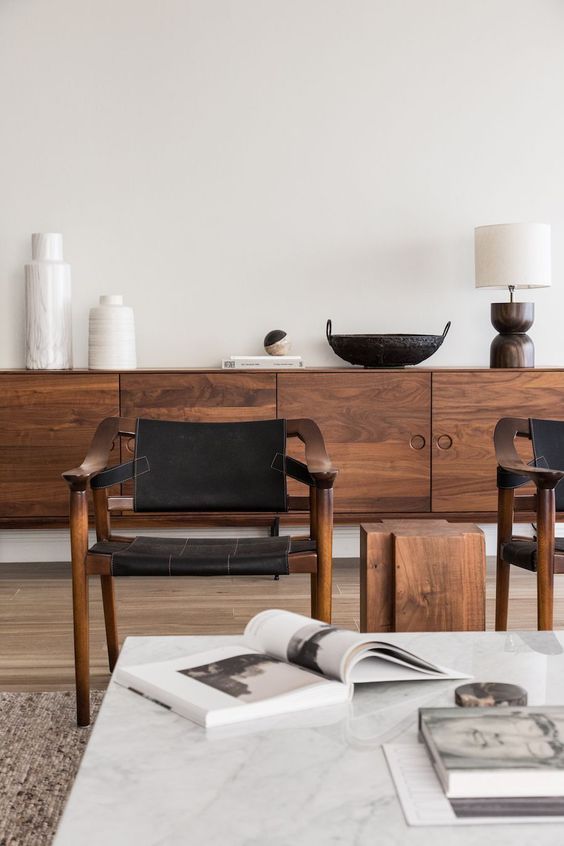 a large and chic rich-stained sideboard with several doors and round handles is a lovely idea for a mid-century modern living room