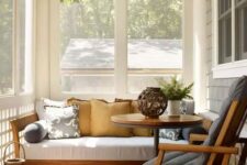 a cozy modern sunroom design