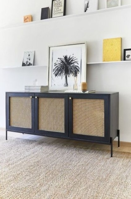 a navy sideboard with cane doors and gold knobs is a chic solution with a bold color combo that will make your space eye-catchy