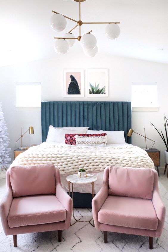 a navy velvet bed with a ribbed headboard will bring color, texture and a cool feel to the space