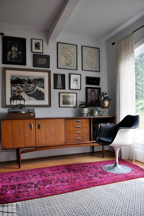 a rich-stained sideboard with doors, drawers and an open compartment for storage plus small metal handles