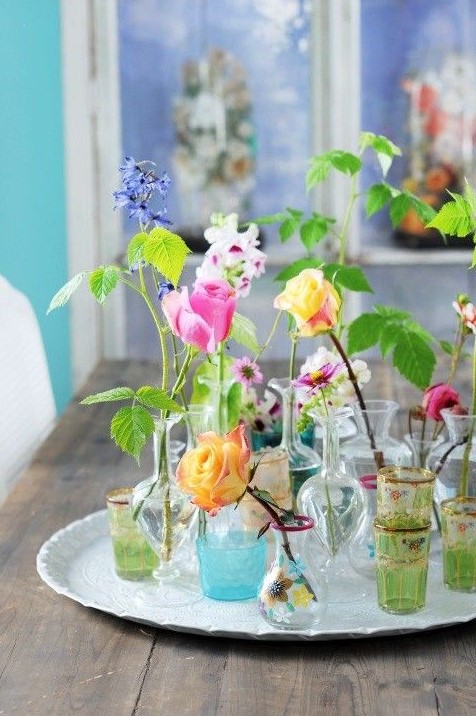 a vintage tray with elegant vases and glasses and bright blooms is a lovely summer decoration for any home