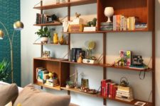 a wall-mounted storage unit with open shelves and open box shelves features a lot of storage space