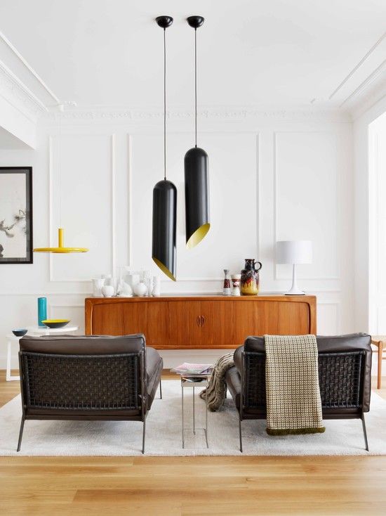 an elegant rich-stained mid-century modern sideboard with only two doors and carved detailing of the edges is wow