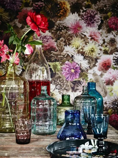 colorful vintage bottles and vases with some bold peonies in them will give you bright summer-like decor and a bold touch