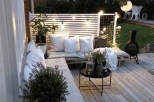 a cool terrace with rattan furniture