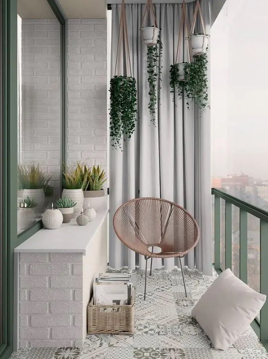 a Scandinavian balcony spruced up with touches of pastel green and pink, looks very peaceful