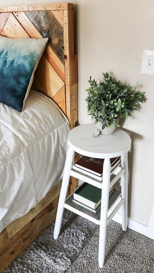 a white wooden stool with tiered shelves can be used as a small nightstand and you needn't change anything to rock it