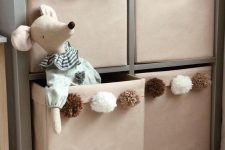 pompom Kallax bins will be cool storage units for any kid’s room and they will add a touch of whimsy