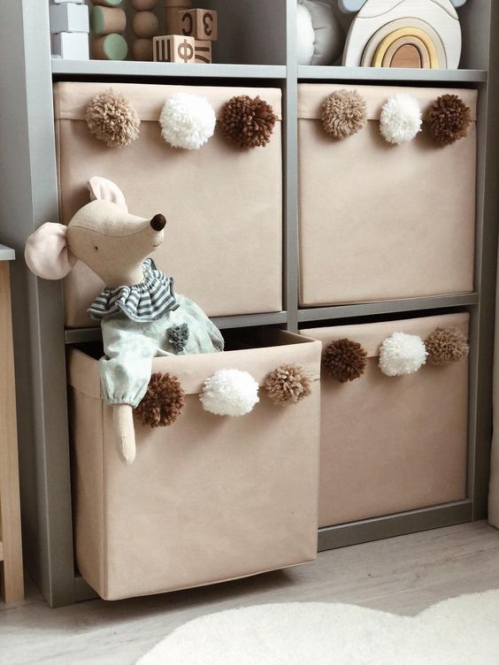 pompom Kallax bins will be cool storage units for any kid's room and they will add a touch of whimsy