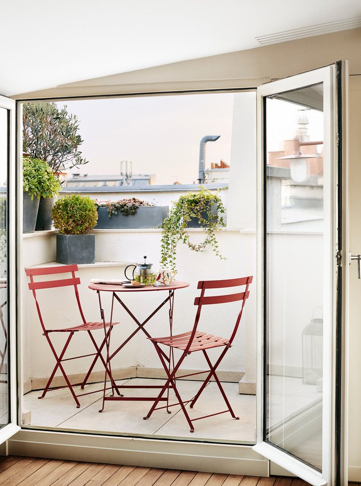 Concrete planters look modern and can survive harsh weather on a balcony. (A+B KASHA Designs)