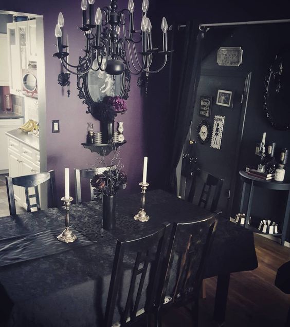 https://www.digsdigs.com/photos/2014/02/a-Gothic-dining-space-with-black-and-purple-walls-black-furniture-an-oversized-mirror-a-vintage-styled-chandelier.jpg