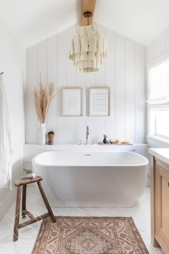 https://www.digsdigs.com/photos/2014/02/a-beautiful-boho-bathroom-with-an-oval-tub-a-beadboard-wall-a-wooden-vanity-a-fabric-chandelier-is-very-chic.jpg