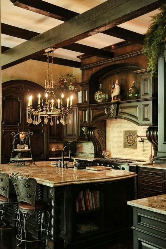 https://www.digsdigs.com/photos/2014/02/a-moody-Gothic-kitchen-with-dark-heavy-furniture-a-white-tile-backsplash-a-chic-ktichen-island-with-a-stone-countertop-catchy-stools-and-a-vintage-chandelier.jpg