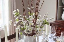 a chic spring or Easter centerpiece of white flowering branches and pussy willow is easy to compose