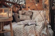 a cozy balcony with a daybed
