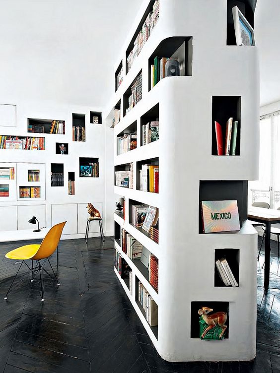 a gorgeous home library idea - lots of built-in bookshelves with black backing to make your books stand out