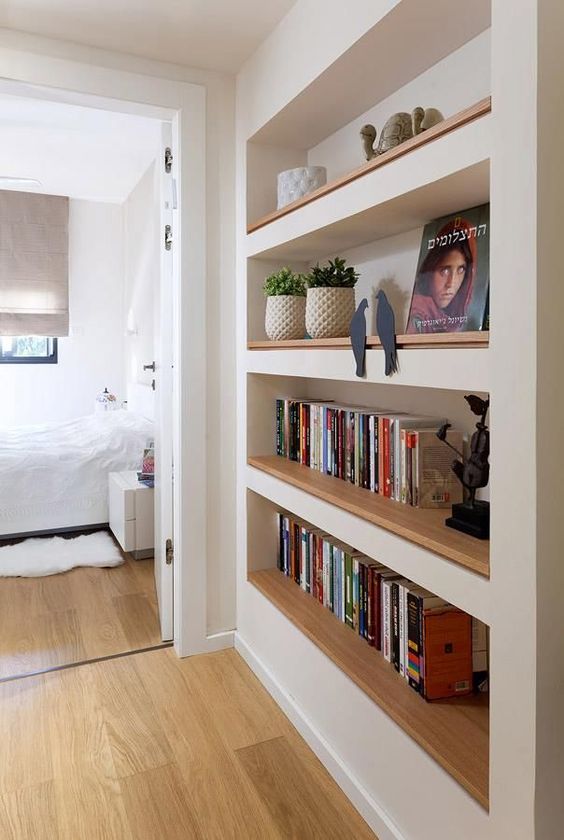 a passway with built-in bookshelves will save a lot of your space and keep all your books in order