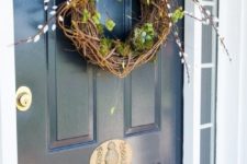 a vine wreath with moss, willow and a fake nest with colorful eggs will be a nice idea for sprign or Easter