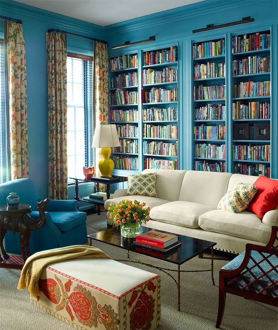 blue built-in bookshelves for designing a whole library in your living room