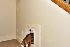 build in a cat litter box into your staircase space, it can be a drawer that is to pull out for cleaning