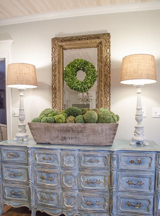 a beautiful and refined vintage whitewashed sideboard with elegant handles will give a sophisticated feel to your space