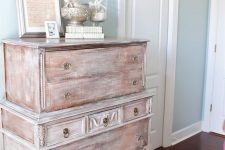 a brush and whitewashed shabby chic sideboard with vintage knobs is a stylish idea for a beach or coastal room