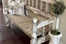 a vintage whitewashed and distressed bench is a refined and decadent solution for a vintage or shabby chic entryway or for a porch