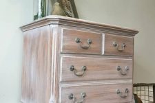 a whitewashed vintage sideboard on refined carved wooden legs is a lovely idea for a farmhouse space