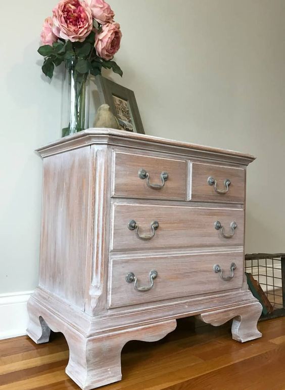 a whitewashed vintage sideboard on refined carved wooden legs is a lovely idea for a farmhouse space