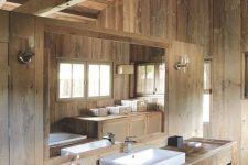 a cozy blonde wood bathroom