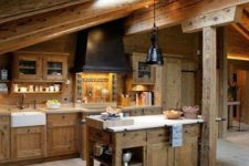 a cool kitchen design with wooden beams