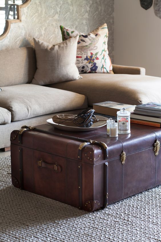 a leather vintage suitcase as a coffee table with a lot of storage and a very chic and bold look