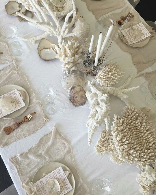 corals lining up the table will give a coastal feel to it and will make the space look relaxed and seaside-like