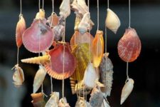 make a pretty seashell and starfish wind chime for your garden for this summer